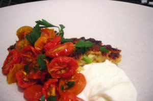 Corn fritters with slow-roasted tomatoes and fromage blanc