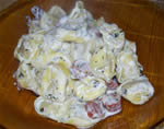 Tortellini con salame e basilico