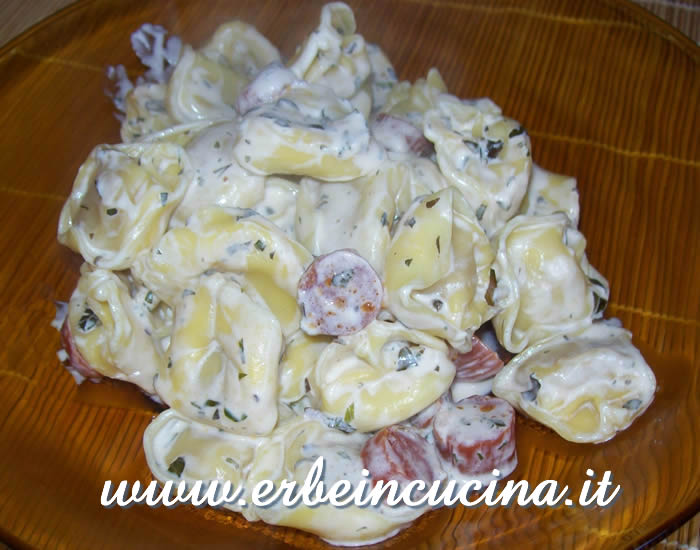 Tortellini with salami and basil