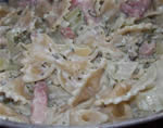 Pasta with onion and cinnamon basil