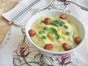 Millet Congee with Egg, Sweet Peas and Roasted Peanuts